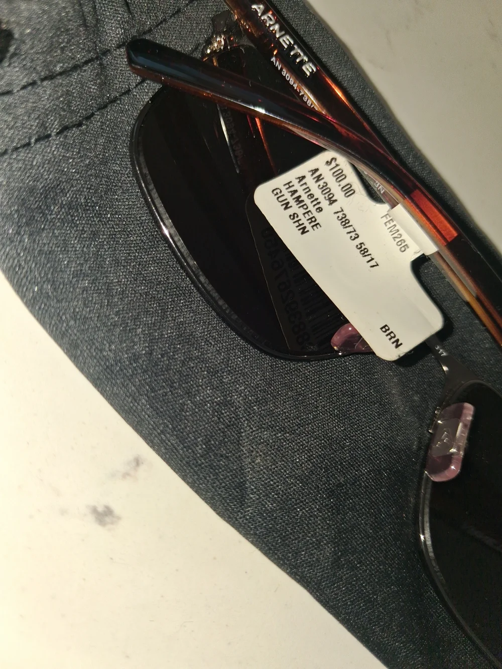 Arnette Hampere AN3094 rectangle sunglasses featuring a brushed gunmetal frame